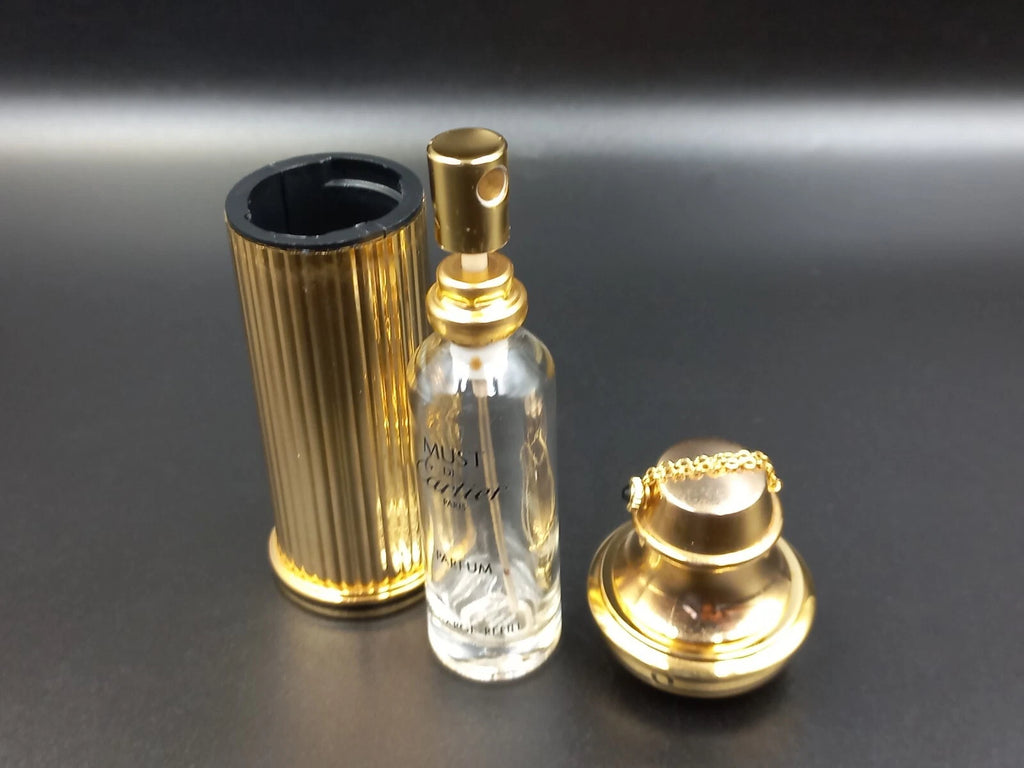 Vaporisateur rechargeable Cartier Doré pour Sac à Main – Luxe Occasion