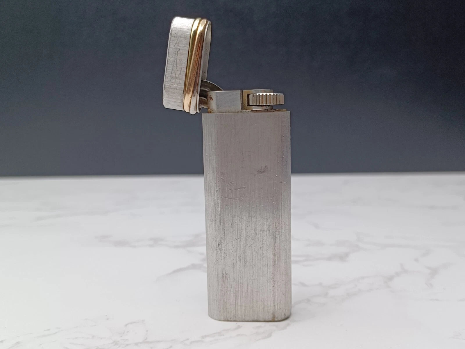Briquet Cartier Trinity Plaqué Argent – Occasion